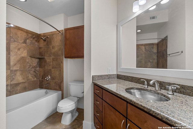 full bath featuring visible vents, tile patterned flooring, bathtub / shower combination, vanity, and toilet