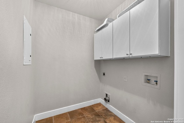 laundry area with cabinet space, washer hookup, baseboards, hookup for an electric dryer, and electric panel