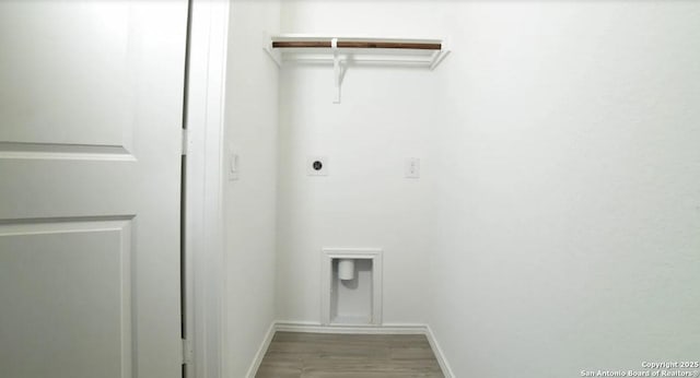 laundry room with baseboards, hookup for an electric dryer, laundry area, and wood finished floors