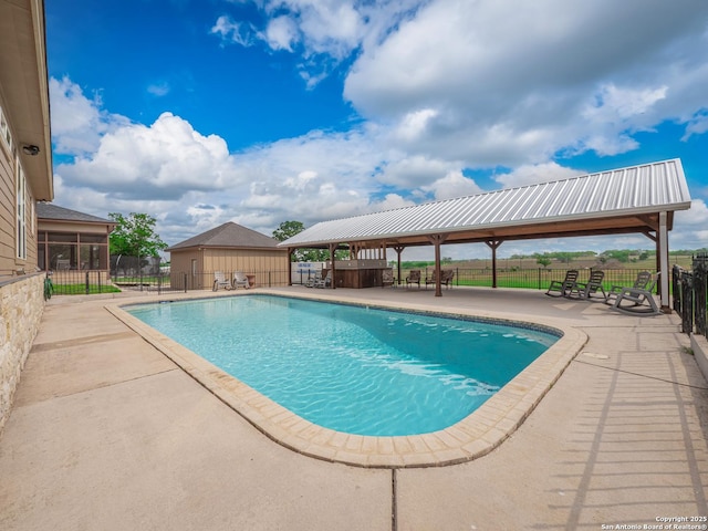 view of pool featuring fence, a gazebo, a fenced in pool, and a patio area