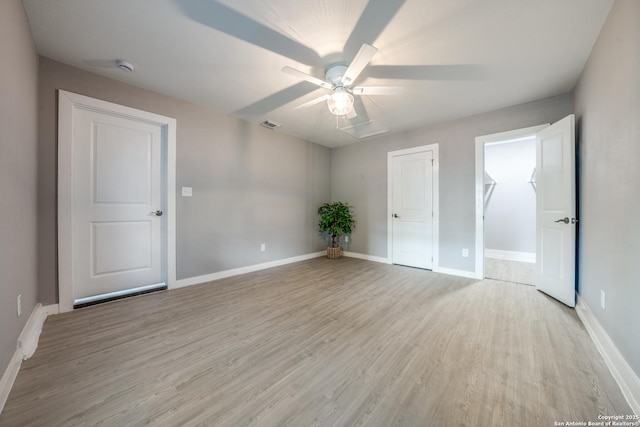 8010 Remuda, San Antonio, TX 78227 - unfurnished bedroom featuring light wood-style floors, baseboards, a ceiling fan, and visible vents