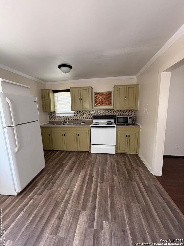 kitchen with white appliances, dark wood-style flooring, backsplash, and green cabinets