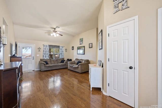 113 E Dawn Dr, Johnson City, TX 78636 - living room with dark wood-type flooring, a ceiling fan, lofted ceiling, and visible vents