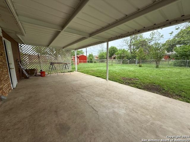 4519 Creekmoor, San Antonio, TX 78220 - view of patio with a storage shed and an outbuilding