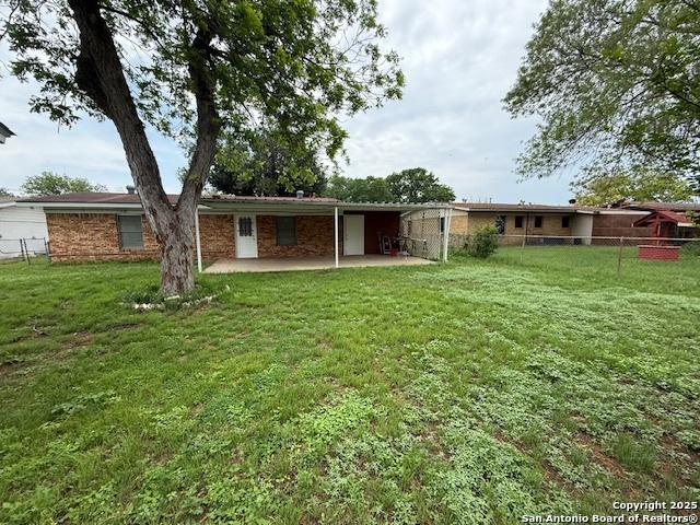 4519 Creekmoor, San Antonio, TX 78220 - rear view of property featuring a patio
