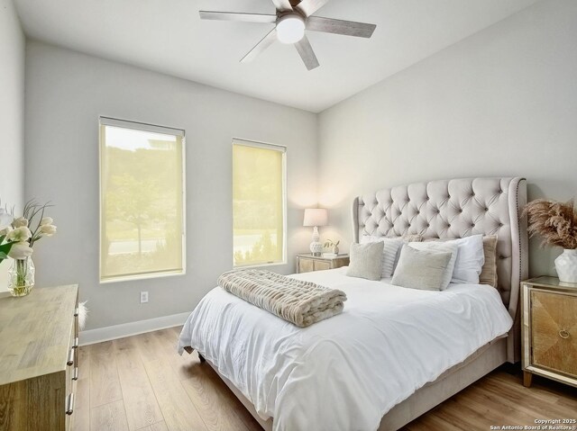 7211 Cresta Bulivar, San Antonio, TX 78256 - bedroom featuring baseboards, ceiling fan, and wood finished floors