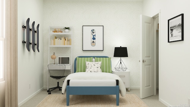 living area with baseboards and carpet