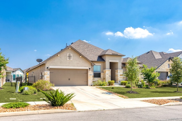 140 Cordova, Boerne, TX 78006 - view of front facade with stucco siding, an attached garage, driveway, roof with shingles, and stone siding