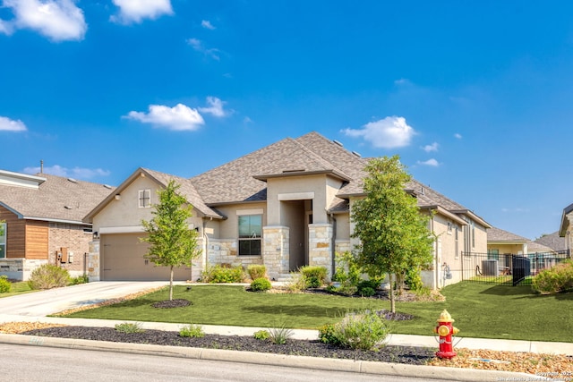 140 Cordova, Boerne, TX 78006 - view of front facade featuring stucco siding, stone siding, concrete driveway, an attached garage, and a shingled roof