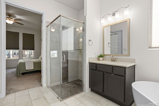 140 Cordova, Boerne, TX 78006 - ensuite bathroom featuring vanity, plenty of natural light, a stall shower, and a soaking tub