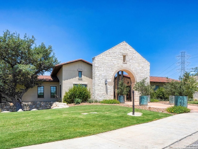140 Cordova, Boerne, TX 78006 - view of front of house featuring a front lawn, stone siding, and stucco siding