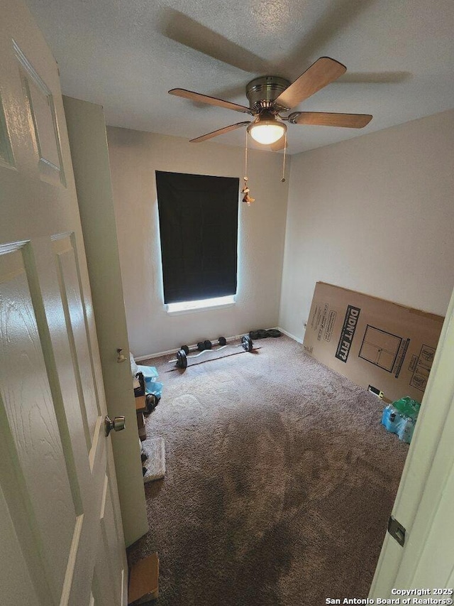 4802 Castle Brg, San Antonio, TX 78218 - unfurnished room featuring ceiling fan, carpet flooring, baseboards, and a textured ceiling