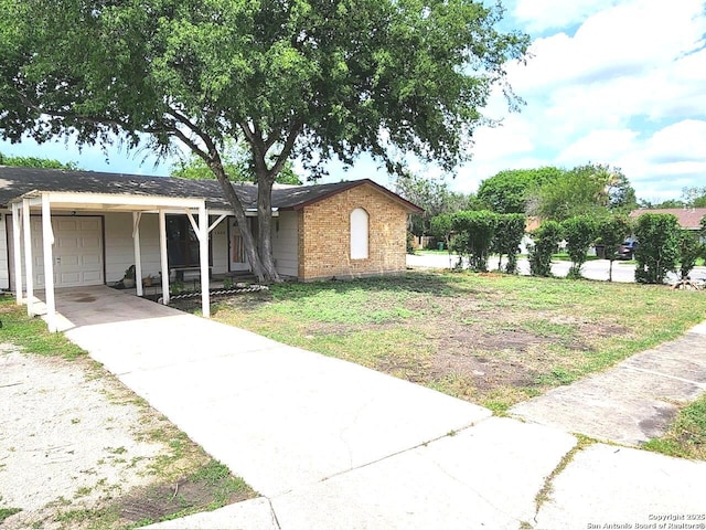 4802 Castle Brg, San Antonio, TX 78218 - view of property exterior with brick siding, concrete driveway, a carport, and a garage