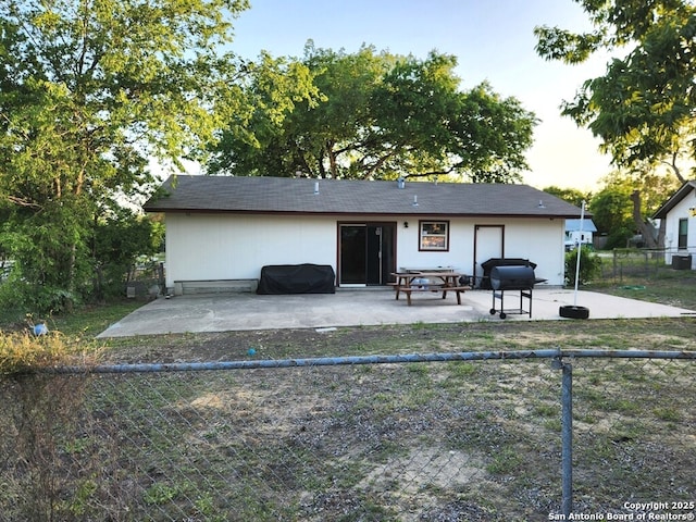 4802 Castle Brg, San Antonio, TX 78218 - back of property featuring a patio area and a fenced backyard