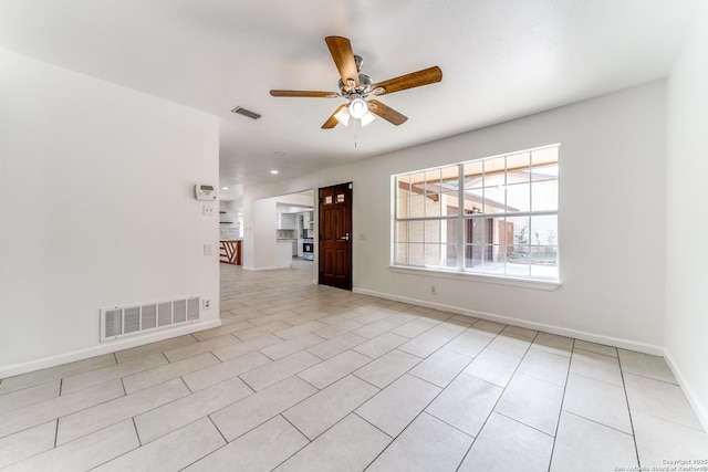 10526 Tioga, San Antonio, TX 78230 - empty room with visible vents, baseboards, and ceiling fan