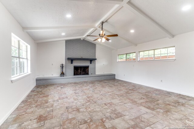 10526 Tioga, San Antonio, TX 78230 - unfurnished living room featuring a brick fireplace, a ceiling fan, baseboards, and stone finish flooring