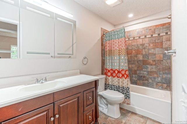 bathroom featuring toilet, a textured ceiling, shower / tub combo with curtain, and vanity
