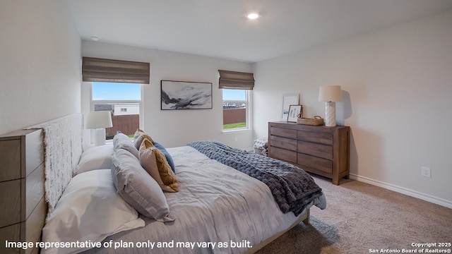 carpeted bedroom with baseboards