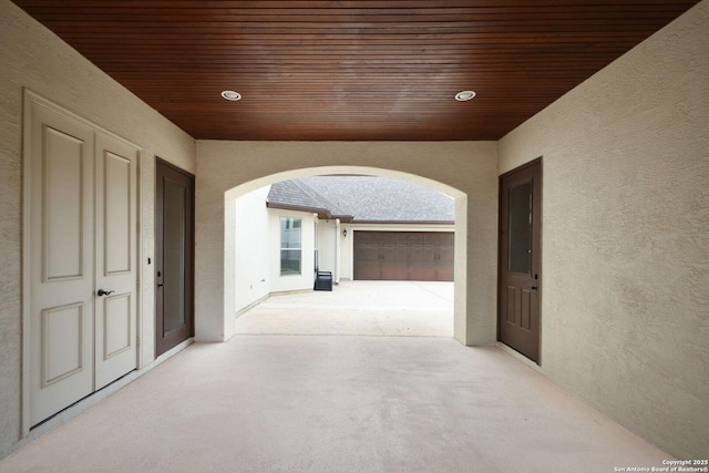 exterior space featuring arched walkways