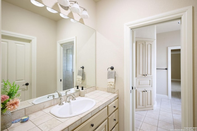 bathroom with vanity and tile patterned floors