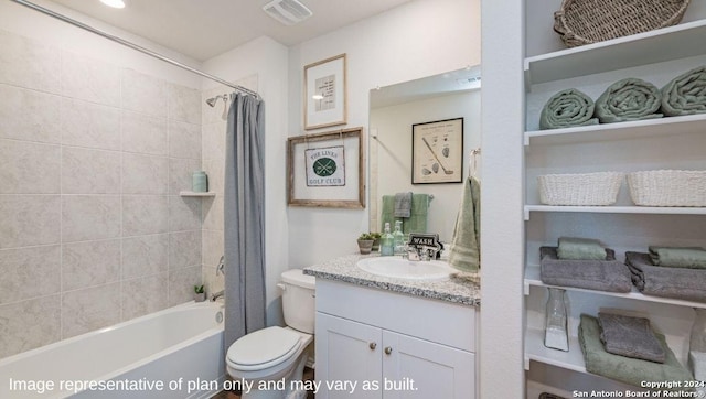 bathroom with visible vents, shower / tub combo with curtain, toilet, and vanity