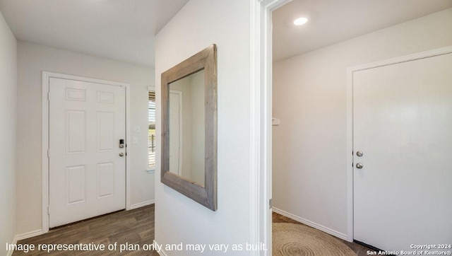 entryway featuring recessed lighting, baseboards, and wood finished floors