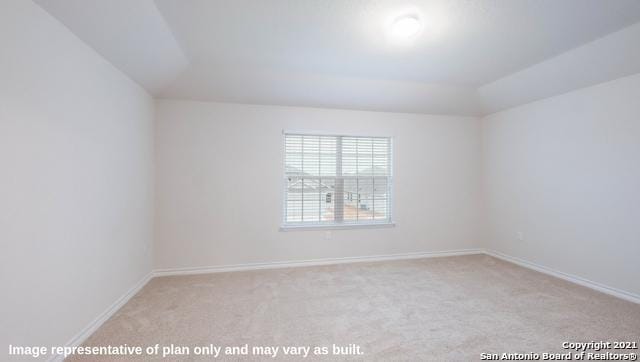 14610 Clay Ridge Run, San Antonio, TX 78253 - carpeted spare room featuring baseboards and lofted ceiling