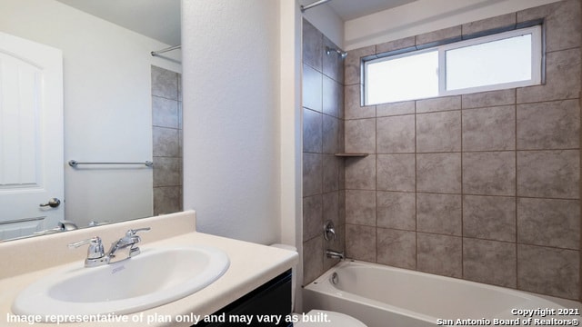 14610 Clay Ridge Run, San Antonio, TX 78253 - bathroom featuring vanity, tub / shower combination, and toilet