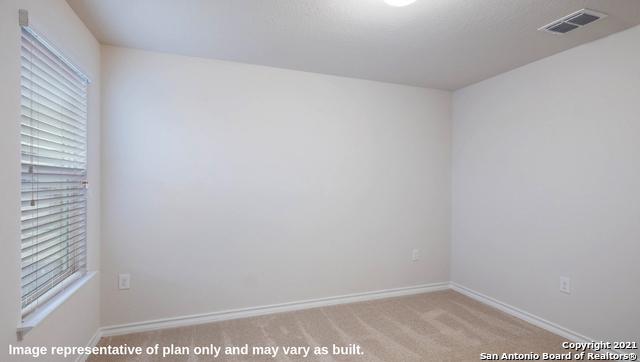 14610 Clay Ridge Run, San Antonio, TX 78253 - carpeted spare room featuring baseboards and visible vents