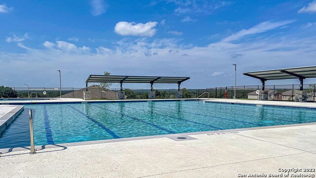14610 Clay Ridge Run, San Antonio, TX 78253 - pool with a patio and fence