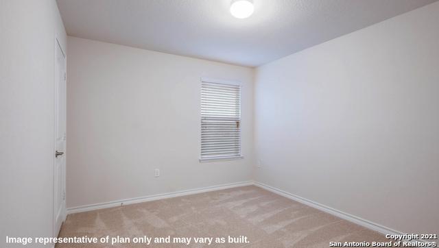 14610 Clay Ridge Run, San Antonio, TX 78253 - carpeted spare room with baseboards