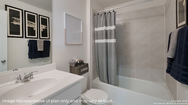 bathroom with vanity, shower / bath combo with shower curtain, and toilet