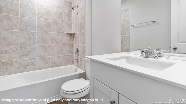 bathroom featuring shower / bath combination, vanity, and toilet