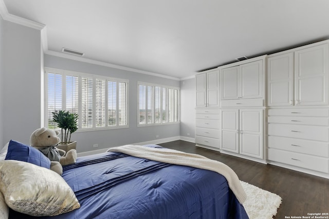 bedroom with crown molding, baseboards, visible vents, and dark wood-type flooring