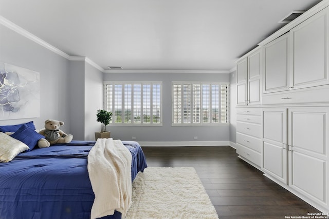 bedroom featuring crown molding, baseboards, dark wood finished floors, and visible vents