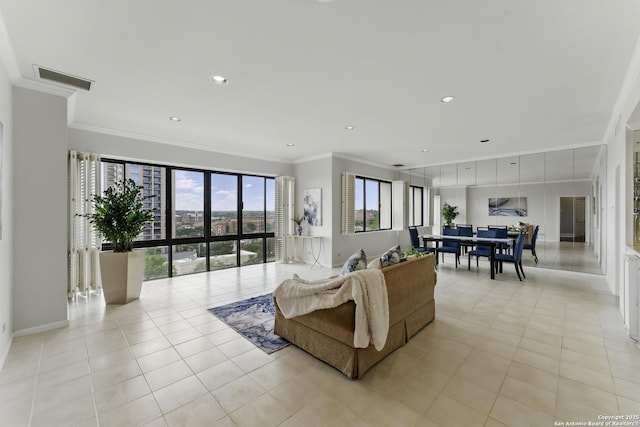 living room featuring ornamental molding, recessed lighting, light tile patterned flooring, and visible vents