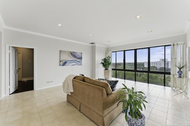 living area featuring recessed lighting, baseboards, ornamental molding, and light tile patterned flooring