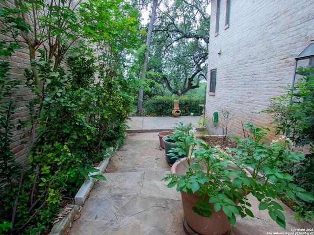 11402 Mission Trace St, San Antonio, TX 78230 - view of yard with fence and a patio area