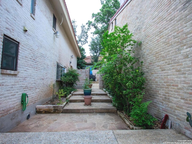 11402 Mission Trace St, San Antonio, TX 78230 - view of side of property with brick siding