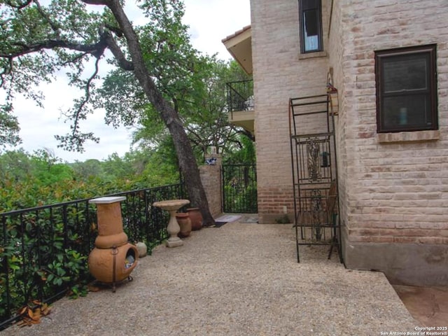 11402 Mission Trace St, San Antonio, TX 78230 - view of home's exterior featuring a balcony