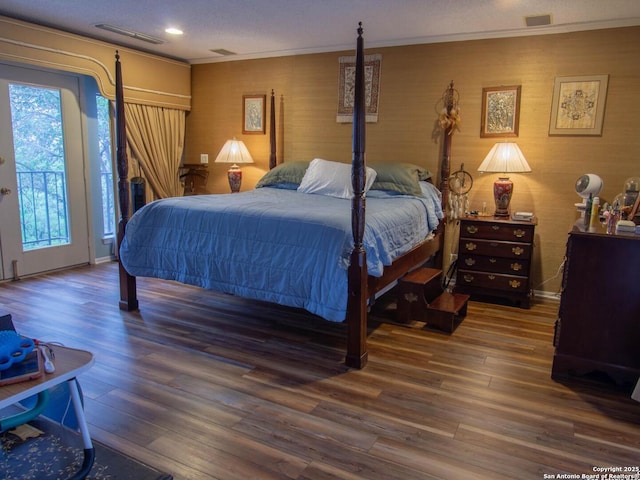 11402 Mission Trace St, San Antonio, TX 78230 - bedroom featuring multiple windows, visible vents, crown molding, wood finished floors, and access to outside