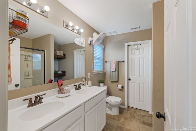 27342 Emilie Cyn, San Antonio, TX 78260 - bathroom with visible vents, a sink, and toilet