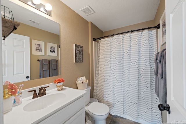 27342 Emilie Cyn, San Antonio, TX 78260 - bathroom with vanity, a textured wall, toilet, and visible vents