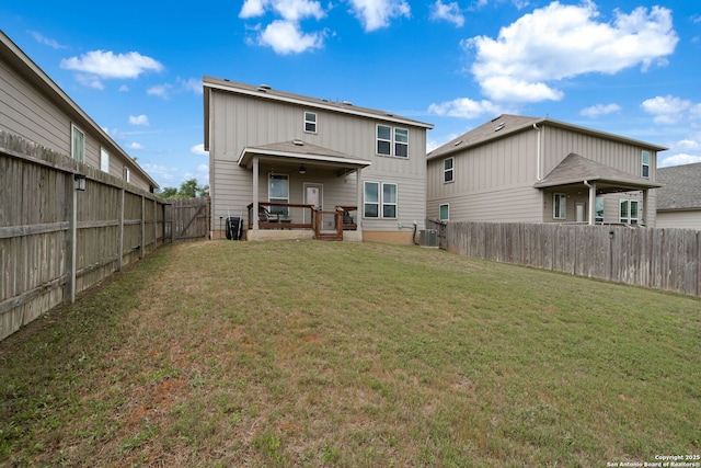 27342 Emilie Cyn, San Antonio, TX 78260 - back of property with a lawn, board and batten siding, a fenced backyard, and central air condition unit