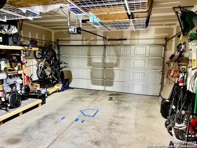 27342 Emilie Cyn, San Antonio, TX 78260 - garage featuring a garage door opener