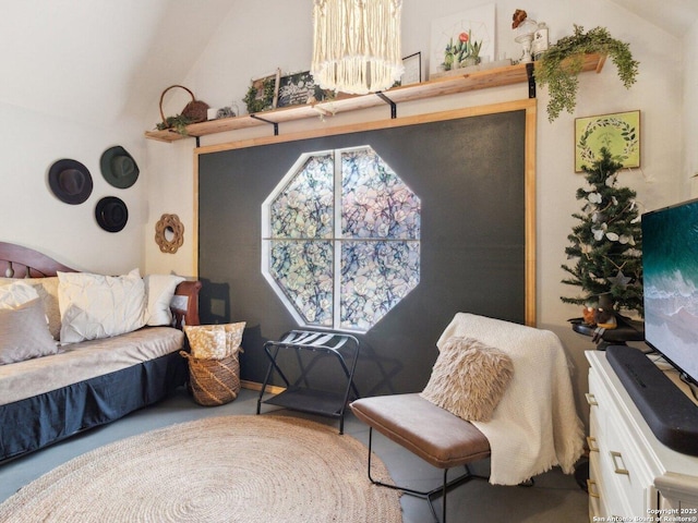 living area featuring vaulted ceiling