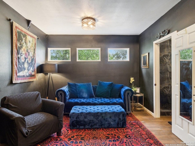 sitting room featuring hardwood / wood-style flooring