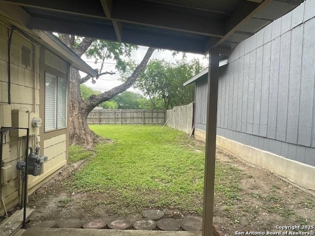 view of yard with fence
