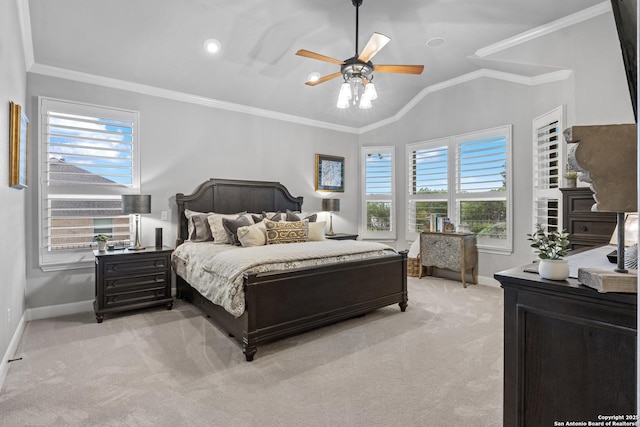 bedroom with light colored carpet, ornamental molding, baseboards, and vaulted ceiling