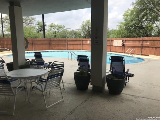 7039 San Pedro Unit 810, San Antonio, TX 78216 - pool with a fenced backyard and a patio